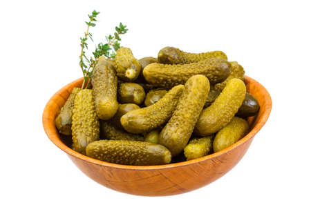 Small Marinated cucumbers in the bowl isolatedの写真素材