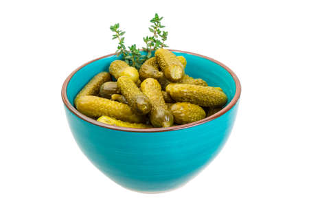 Small Marinated cucumbers in the bowl isolatedの写真素材