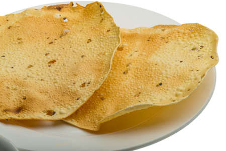Pappadoms - famous Indian bread with sauce