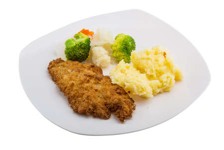 Schnitzel with mash potato and cabbageの写真素材