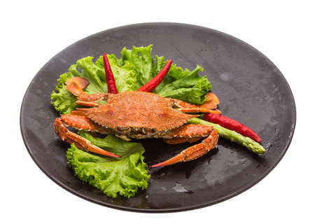 Boiled crab with pepper and saladの写真素材