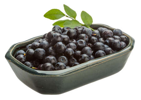 Blueberry with leaves isolated on white backgroundの写真素材