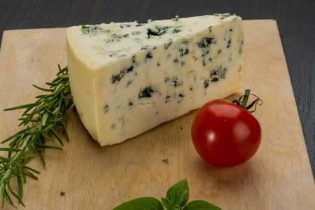 Blue cheese with rosemary and mintの写真素材