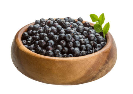 Blueberry with leaves isolated on white backgroundの写真素材