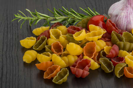 Raw shell pasta with herbsの写真素材