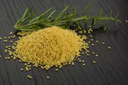 Raw Couscous on the deskの写真素材
