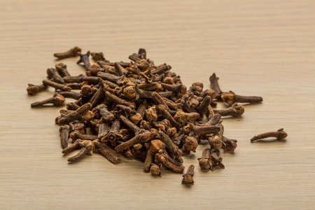 Clove seeds on the deskの写真素材