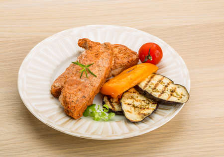 Pork steak with grilled vegetablesの写真素材