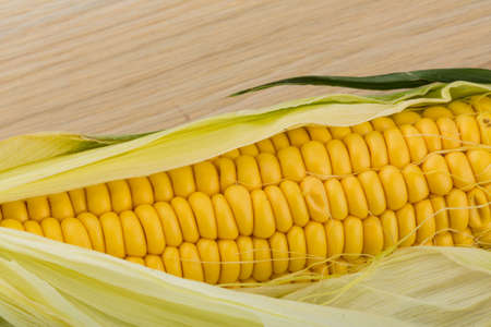 Ripe corn on the board
