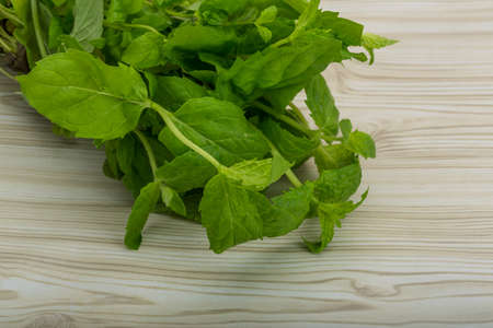 fresh Mint leaves - on the board