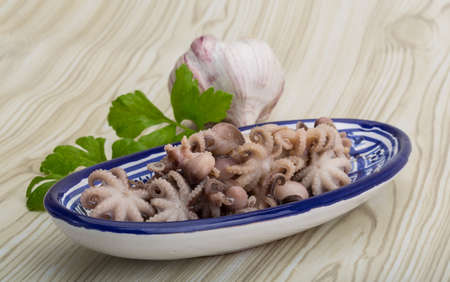Boiled octopus - mini seafood in the bowlの写真素材