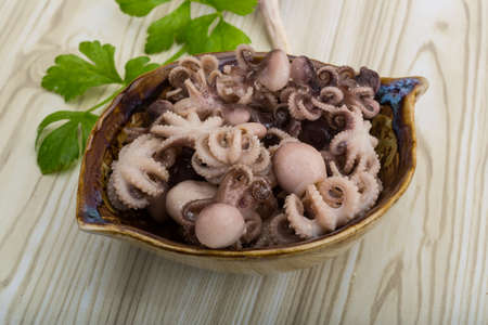 Boiled octopus - mini seafood in the bowlの写真素材
