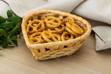 Pretzels in the bowl on wooden backgroundの写真素材