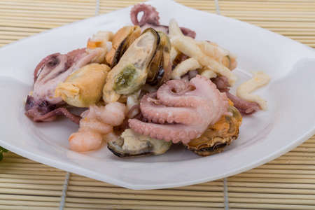 Seafood cocktail with octopus, shrimp, calamari and musselの写真素材