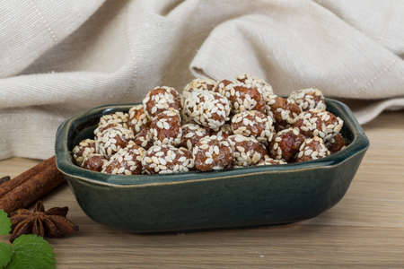 Peanut in honey with sesame seeds in the bowlの写真素材