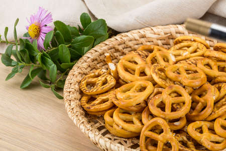Pretzels in the bowl on wooden backgroundの写真素材