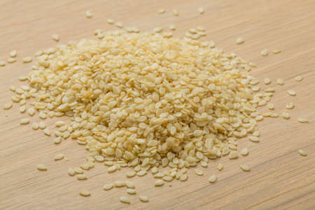 Sesame seeds heap on the deskの写真素材