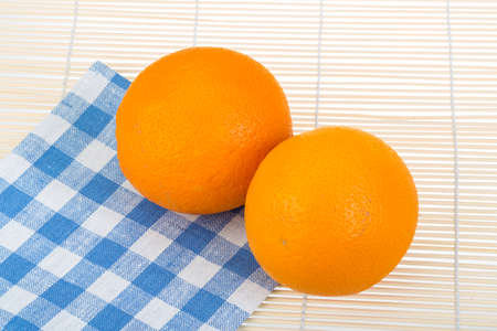Fresh ripe Oranges on the wood background