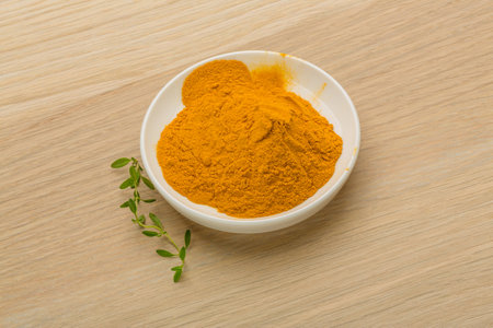 Curcuma powder in the bowl