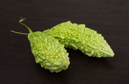 Asian vegetable - momordica on the wood background
