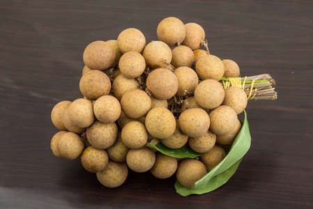 Asian fruit Longan - on wood background