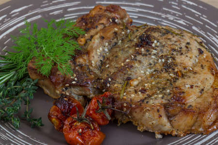 Roasted pork with rosemary and thyme spicesの写真素材