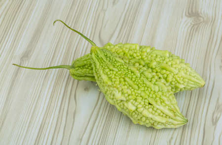 Asian vegetable - momordica on the wood backgroundの写真素材