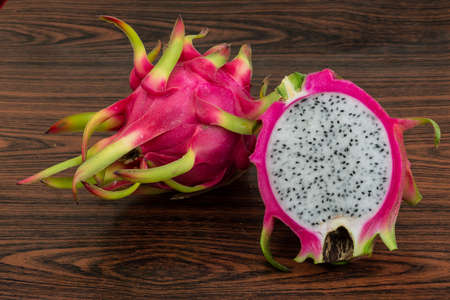 Asian Dragon fruit on the wooden backgroundの写真素材