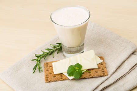 Traditional dietary dairy produkt kefir with napkin and bread
