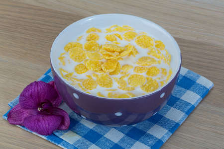 Breakfast with cornflakes on the white background