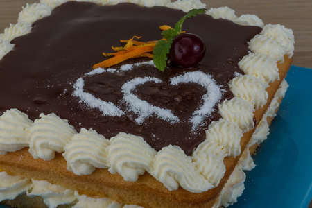 Valentine Chocolate icing cake with flower and hearts
