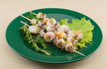 Grilled cuttlefish bbq with rosemary and pepperの写真素材