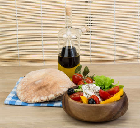 Traditional Greek salad with feta cheese and fresh vegetablesの写真素材