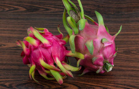 Asian Dragon fruit on the wooden backgroundの写真素材