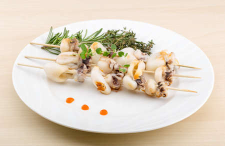 Grilled cuttlefish bbq with rosemary and pepperの写真素材