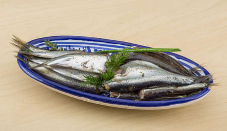 Salted anchovy with spices and herbs - ready for eatの写真素材