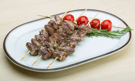 Grilled chicken hearts barbecue with sesame and rosemaryの写真素材