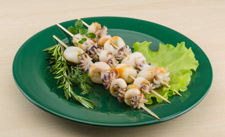 Grilled cuttlefish bbq with rosemary and pepperの写真素材