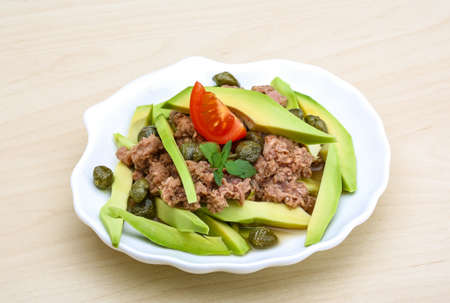 Tuna and avocado with celery and capersの写真素材