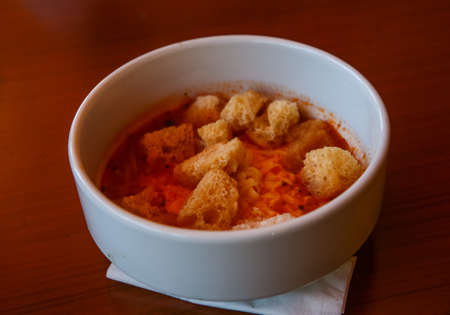 Tomato soup with cheese, herbs and croutoonsの写真素材