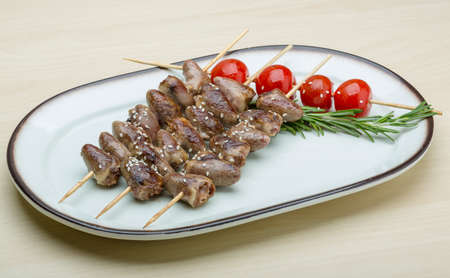 Grilled chicken hearts barbecue with sesame and rosemaryの写真素材