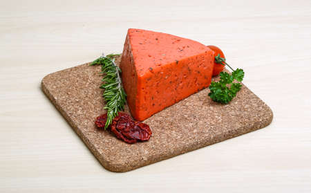 Red cheese pesto with dry tomato and rosemaryの写真素材