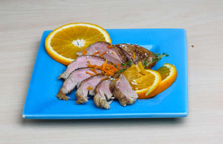 Roasted duck breast with orange and sesame seedsの写真素材