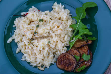 Italian trditional Risotto with eggplant and corianderの写真素材