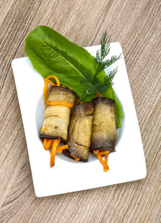 Eggplant rolls with carrot served spices and corianderの写真素材