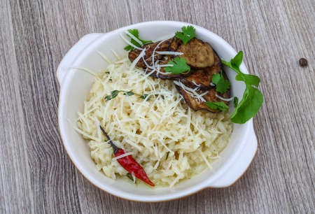 Italian trditional Risotto with eggplant and corianderの写真素材