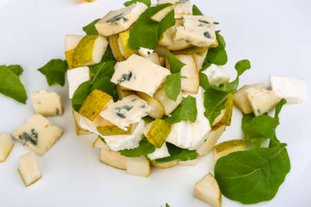 Sweet pear, blue cheese and rucola salad with sesame seedsの写真素材