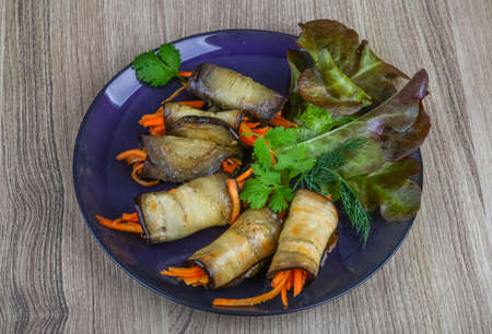 Eggplant rolls with carrot served spices and corianderの写真素材