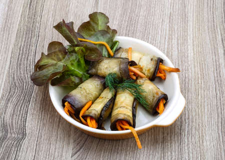 Eggplant rolls with carrot served spices and corianderの写真素材