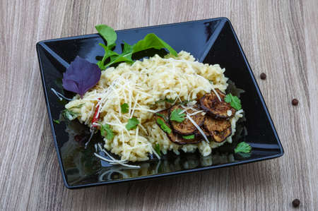 Italian trditional Risotto with eggplant and corianderの写真素材